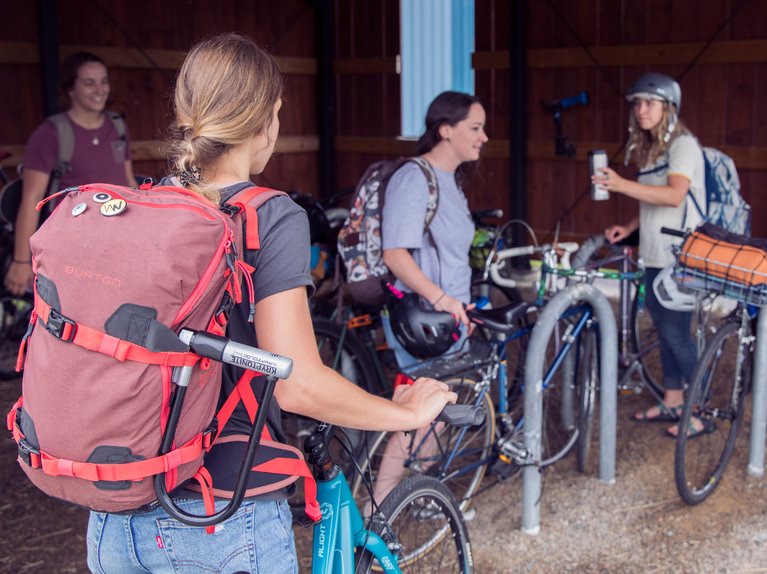 Burton employees parking their bikes at the Burton bike shed