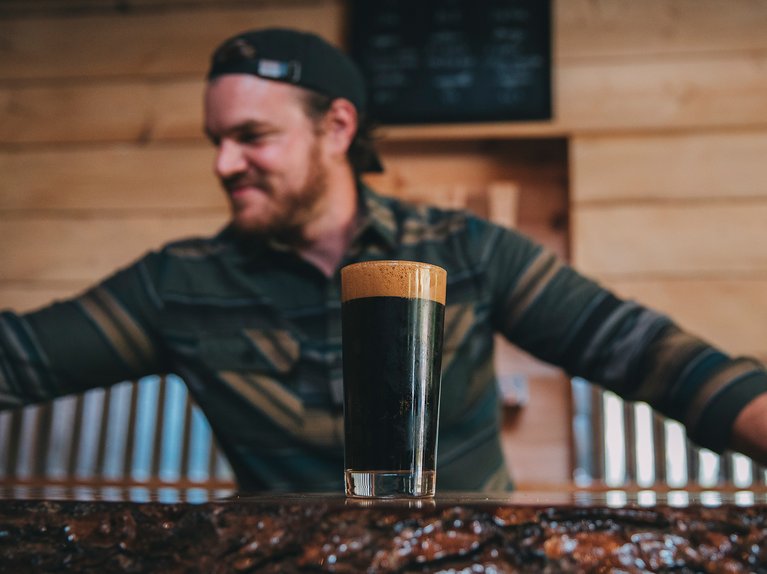 Glass of beer made by Taylor Mayo's husband