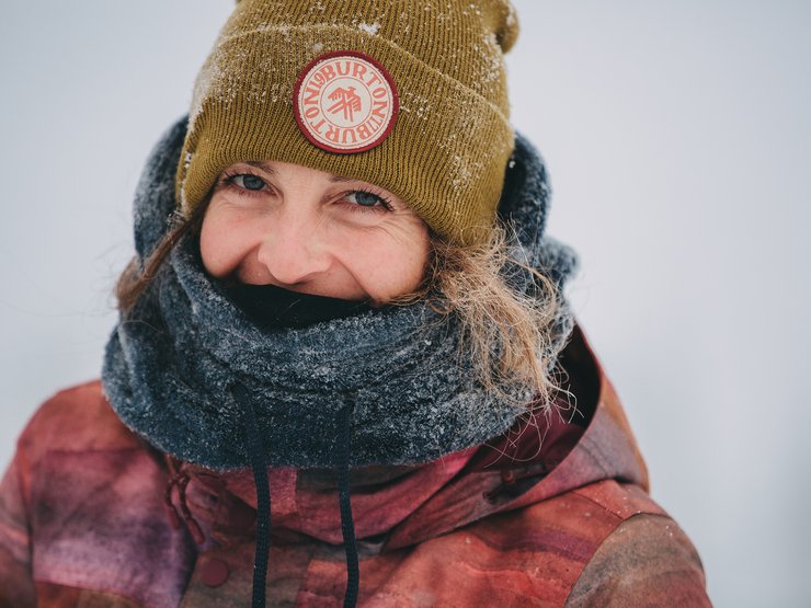 All smiles and covered in snow.