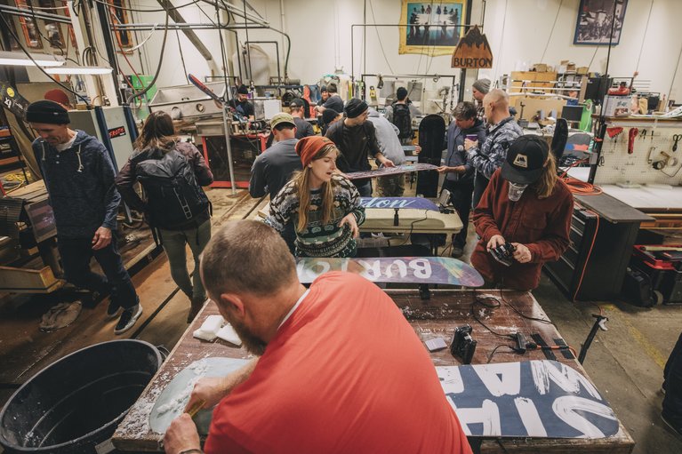 Burton employees tuning their snowboards.